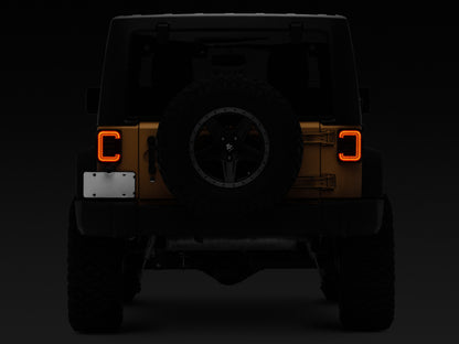 Raxiom 07-18 Jeep Wrangler JK Axial Series LED Halo Tail Lights- Black Housing (Dark Smoked Lens) J138358 J138358 Photo - Close Up
