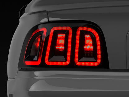 Raxiom 96-98 Ford Mustang Icon LED Tail Lights- Black Housing (Smoked Lens) 389876 389876 Photo - Primary