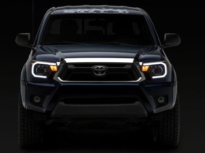 Raxiom 12-15 Toyota Tacoma Axial Projector Headlights w/ SEQL LED Bar- Blk Housing (Clear Lens) TT21850 TT21850 Photo - Close Up