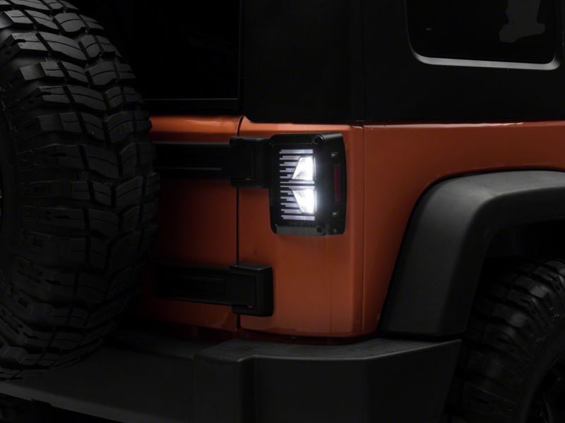 Raxiom 07-18 Jeep Wrangler JK Axial Series Vision LED Tail Lights- Blk Housing (Clear Lens) J130809 J130809 Photo - Close Up