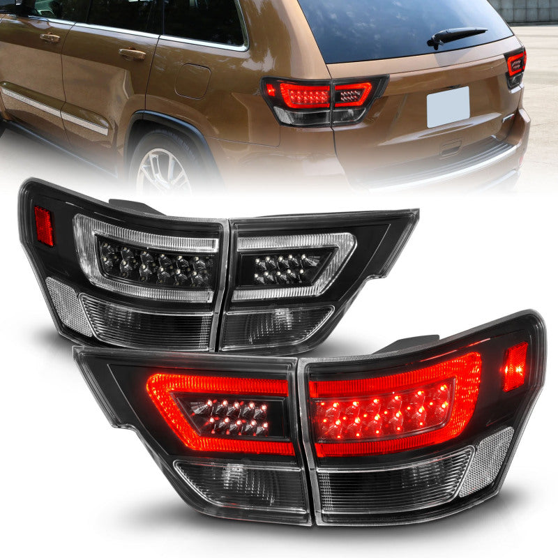 ANZO 11-13 Jeep Grand Cherokee LED Taillights w/ Lightbar Black Housing/Clear Lens 4pcs 311439 311439 Photo - Primary