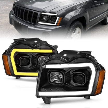 ANZO 2005-2007 Jeep Grand Cherokee Projector Headlights w/ Light Bar Switchback Black Housing 111543 111543 Photo - Primary