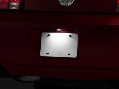 Raxiom 05-09 Ford Mustang Axial Series LED License Plate Lamps 413032 413032 Photo - Close Up