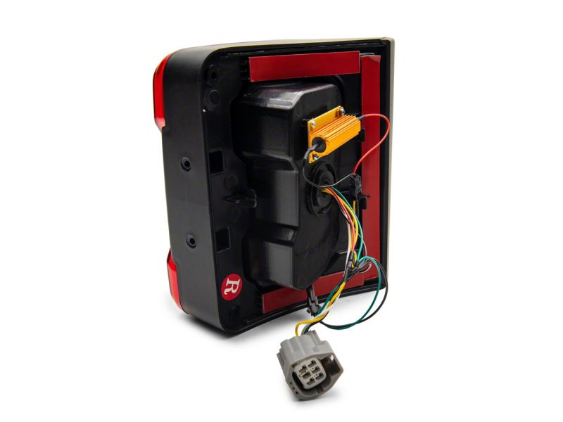 Raxiom 07-18 Jeep Wrangler JK Axial Series JL Style LED Tail Lights- BlkHousing- Red Lens J164242 J164242 Photo - Close Up