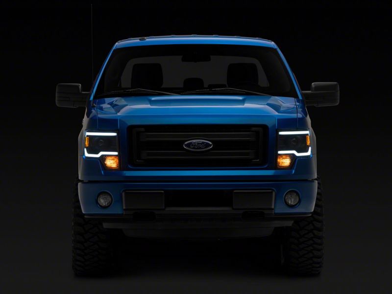 Raxiom 09-14 Ford F-150 Axial Series Projector Headlights w/ LED Light Bar- Blk Housing (Clear Lens) T566369 T566369 Photo - Close Up