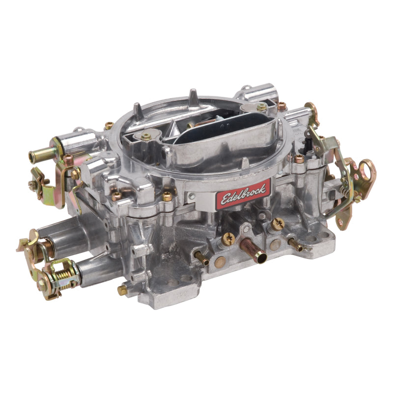 Edelbrock RECONDITIONED CARB #1405, 1 7/8" x 3"  Steel Collector w/ 7-8" Long 9905 Photo - out of package