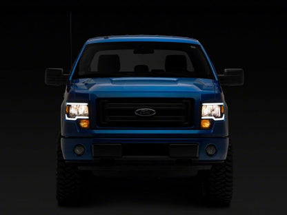 Raxiom 09-14 Ford F-150 Axial Series Headlights w/ LED Bar- Blk Housing (Clear Lens) T566367 T566367 Photo - Close Up