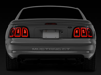 Raxiom 96-98 Ford Mustang Icon LED Tail Lights- Black Housing (Smoked Lens) 389876 389876 Photo - Close Up