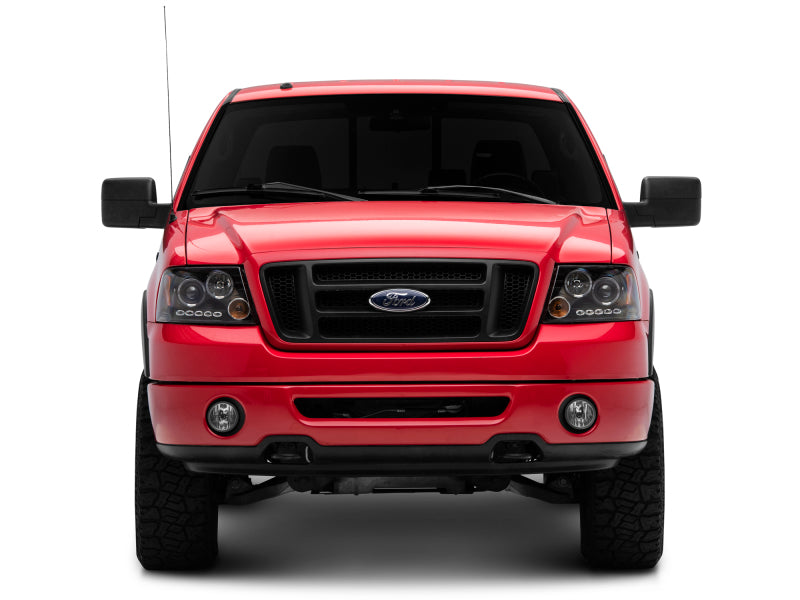 Raxiom 04-08 Ford F-150 Dual LED Halo Projector Headlights- Black Housing (Clear Lens) T542827 T542827 Photo - Close Up