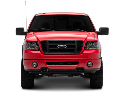 Raxiom 04-08 Ford F-150 Dual LED Halo Projector Headlights- Black Housing (Clear Lens) T542827 T542827 Photo - Close Up