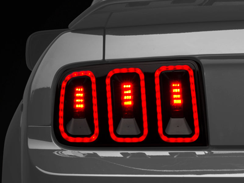 Raxiom 05-09 Ford Mustang Gen5 Tail Lights- Black Housing (Smoked Lens) 49169 49169 Photo - Close Up