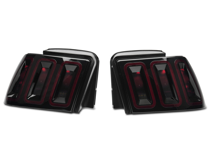 Raxiom 99-04 Ford Mustang Excluding 99-01 Cobra Icon LED Tail Lights- Black Housing (Smoked Lens) 100807 100807 Photo - Close Up
