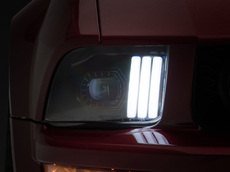 Raxiom 05-09 Ford Mustang w/ Halogen Prjctor Headlights- Black Housing (Clear Lens) (No GT500 ) 415794 415794 Photo - Close Up