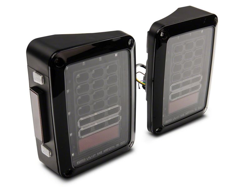 Raxiom 07-18 Jeep Wrangler JK Axial Series LED Tail Lights- Blk Housing (Clear Lens) J141585 J141585 Photo - Close Up