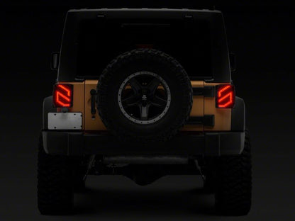 Raxiom 07-18 Jeep Wrangler JK Axial Series Trident LED Tail Lights- Blk Housing (Clear Lens) J173719 J173719 Photo - Close Up