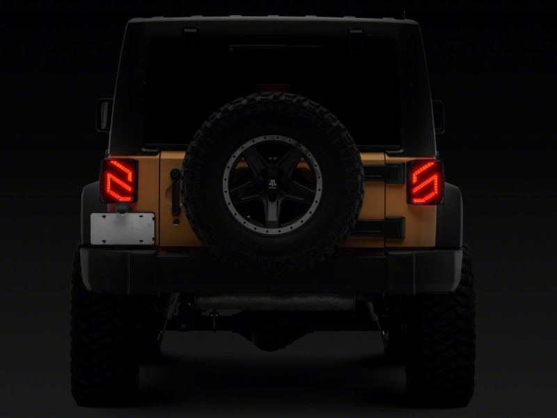 Raxiom 07-18 Jeep Wrangler JK Axial Series Trident LED Tail Lights- Blk Housing (Clear Lens) J173719 J173719 Photo - Close Up