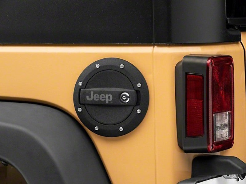 Officially Licensed Jeep 07-18 Jeep Wrangler JK Locking Fuel Door w/ Engraved Jeep Logo oljJ157748