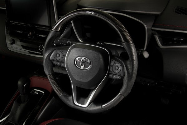 TOM'S Racing Carbon Steering Wheel - 2019+ Toyota Corolla Hatchback