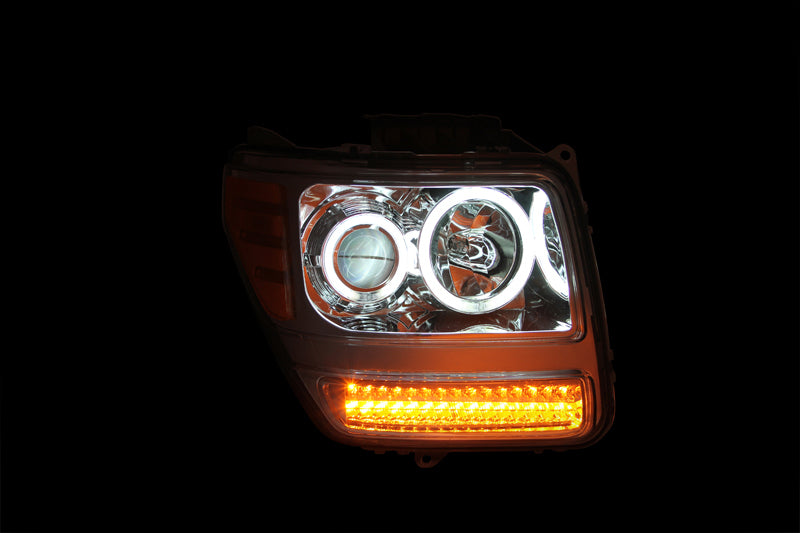 Anzo 2007-2012 Dodge Nitro Projector Headlights w/ Halo Chrome (CCFL) G2 111144 Photo - Mounted