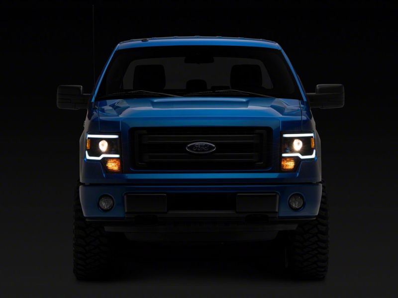 Raxiom 09-14 Ford F-150 Axial Series Projector Headlights w/ LED Light Bar- Blk Housing (Clear Lens) T566369 T566369 Photo - Close Up