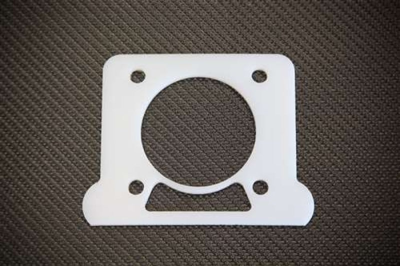 Torque Solution Thermal Throttle Body Gasket: 02-05 Subaru WRX 2.0T (Drive By Cable) TS-TBG-065 TS-TBG-065 Photo - Primary