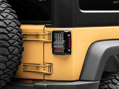 Raxiom 07-18 Jeep Wrangler JK Axial Series Lux LED Tail Lights- Blk Housing (Clear Lens) J141596 J141596 Photo - Close Up