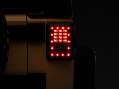 Raxiom 07-18 Jeep Wrangler JK Axial Series LED Tail Lights- Blk Housing (Clear Lens) J141585 J141585 Photo - Close Up