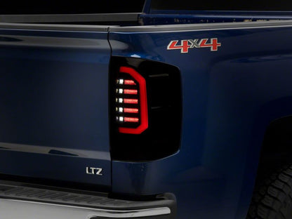 Raxiom 14-18 Chevrolet Silverado 1500 Axial Series LED Tail Lights- Blk Housing (Smoked Lens) S151298 S151298 Photo - Close Up