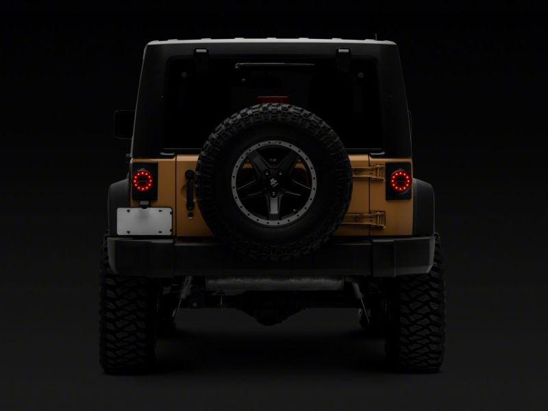Raxiom 07-18 Jeep Wrangler JK Axial Series Halo LED Tail Lights- Blk Housing (Clear Lens) J164240 J164240 Photo - Close Up