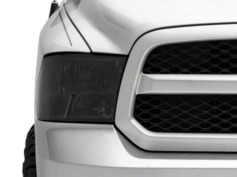 Raxiom 09-18 Dodge RAM 1500 Axial OEM Rep Headlights w/ Dual Bulb- Chrome Housing (Smoked Lens ) R118021 R118021 Photo - Close Up