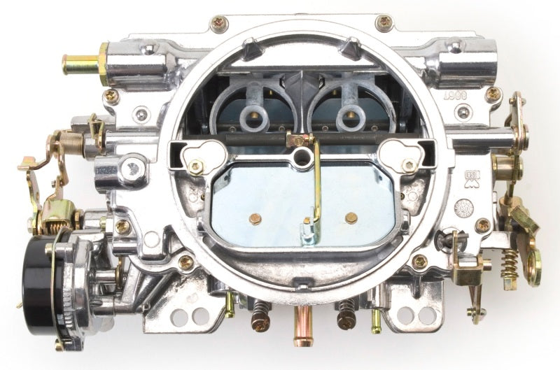 Edelbrock Reconditioned Carb #1406, 1 7/8" x 3 1/2"  Steel Collector w/ 7-8" 9906 Photo - Unmounted