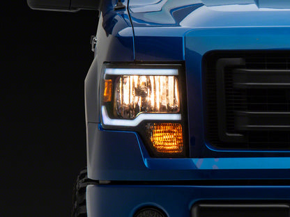 Raxiom 09-14 Ford F-150 Axial Series Headlight w/ SEQL LED Bar- Blk Housing (Clear Lens) T566368 T566368 Photo - Primary