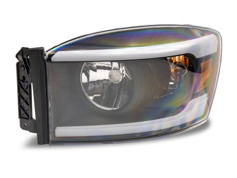 Raxiom 06-09 Dodge RAM 1500/2500/3500 Axial Headlights w/ SEQL LED Bar- Blk Housing (Clear Lens) R131480 R131480 Photo - Close Up