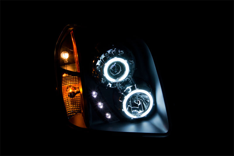 Anzo 2007-2014 Gmc Yukon Projector Headlights w/ Halo Black (CCFL) 111148 Photo - Mounted