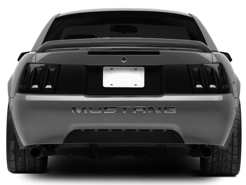 Raxiom 99-04 Ford Mustang Excluding 99-01 Cobra Icon LED Tail Lights- Black Housing (Smoked Lens) 100807 100807 Photo - Close Up