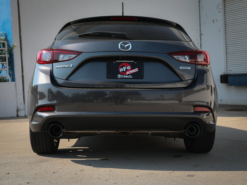 aFe Takeda 2-1/2in 304 SS Cat-Back Exhaust w/ Blue Flame Tips 14-18 Mazda 3 L4 2.0L/2.5L 49-37015-L 49-37015-L Photo - Mounted