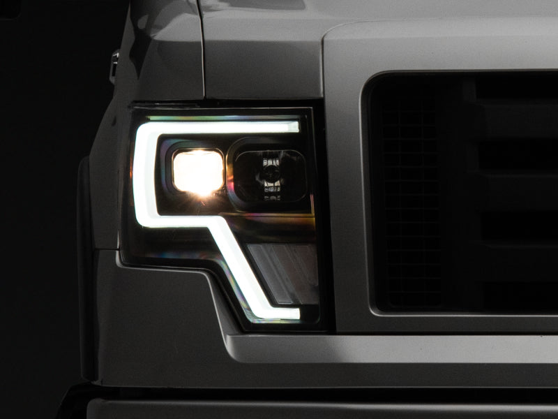 Raxiom 09-14 Ford F-150 G4 Projector Headlights- Black Housing (Clear Lens) T544003 T544003 Photo - Primary