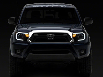 Raxiom 12-15 Toyota Tacoma Axial Series Projector Headlights w/ LED Bar- Blk Housing (Clear Lens) TT21849 TT21849 Photo - Close Up