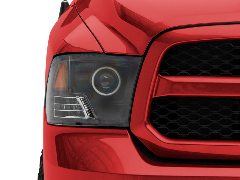 Raxiom 09-18 RAM 1500 Super White LED Halo Projector Headlights- Black Housing (Clear Lens) R110150 R110150 Photo - Close Up