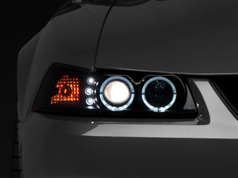 Raxiom 99-04 Ford Mustang Dual LED Halo Projector Headlights- Black Housing (Smoked Lens) 49113 49113 Photo - Primary