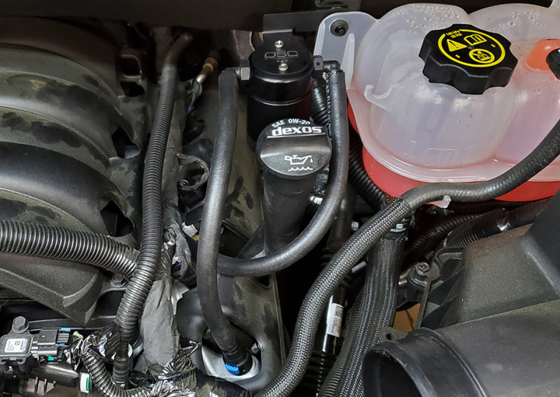 J&L 19-22 Chevrolet Silverado/GMC Sierra 1500 5.3L V8 Driver Side Oil Separator 3.0 - Black Anod 3086D-B 3086D-B Photo - Mounted