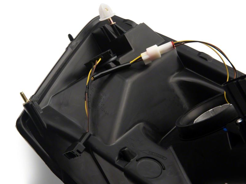 Raxiom 06-09 Dodge RAM 1500/2500/3500 Axial Headlights w/ SEQL LED Bar- Blk Housing (Clear Lens) R131480 R131480 Photo - Close Up