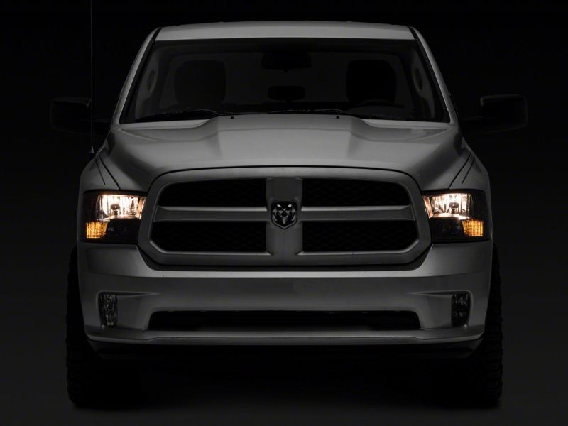 Raxiom 09-18 Dodge RAM 1500 Axial Series Euro Style Headlights w/ Dual Bulb Blk Housing (Clear Lens) R118016 R118016 Photo - Close Up