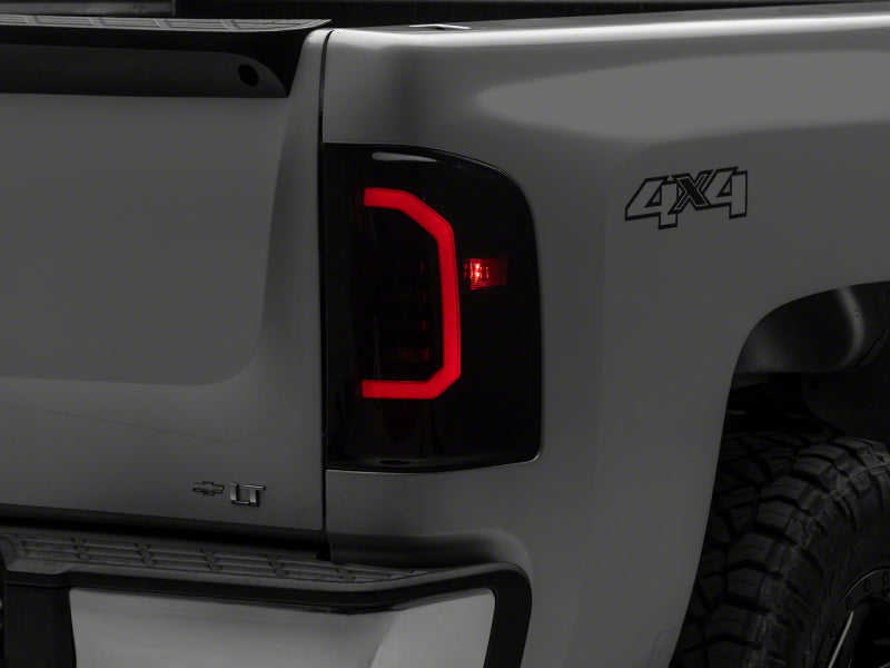 Raxiom 07-14 Chevrolet Silverado 1500 Axial Series LED Tail Lights- Blk Housing (Smoked Lens) S150366 S150366 Photo - Primary
