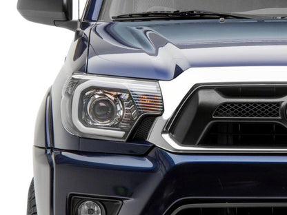 Raxiom 12-15 Toyota Tacoma Axial Series Projector Headlights w/ LED Bar- Blk Housing (Clear Lens) TT21849 TT21849 Photo - Close Up