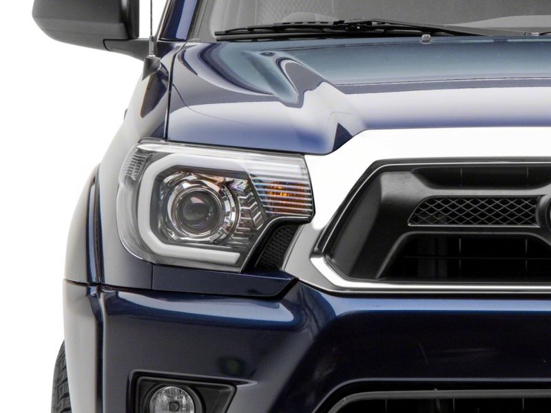 Raxiom 12-15 Toyota Tacoma Axial Series Projector Headlights w/ LED Bar- Blk Housing (Clear Lens) TT21849 TT21849 Photo - Close Up