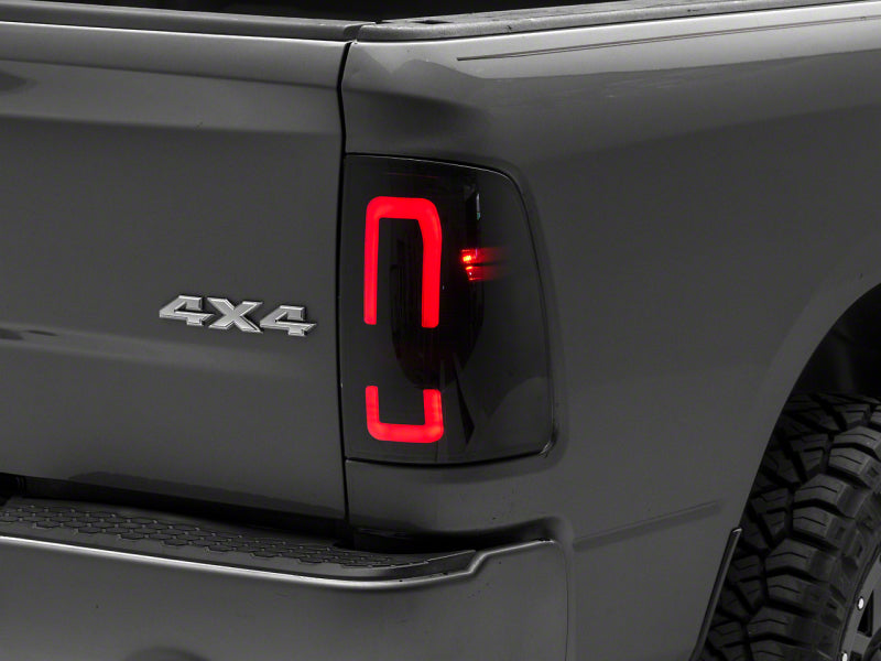 Raxiom 09-18 Dodge RAM 1500/2500/3500 Axial Series LED Tail Lights- Blk Housing (Smoked Lens) R131284 R131284 Photo - Primary