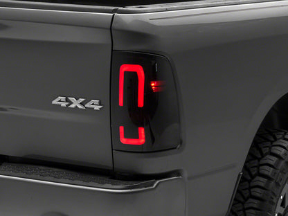 Raxiom 09-18 Dodge RAM 1500/2500/3500 Axial Series LED Tail Lights- Blk Housing (Smoked Lens) R131284 R131284 Photo - Primary