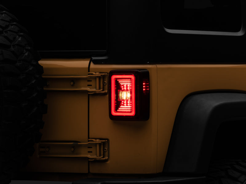 Raxiom 07-18 Jeep Wrangler JK JL Style LED Tail Lights- Black Housing - Red Lens J133626 J133626 Photo - Close Up