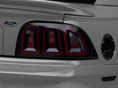 Raxiom 96-98 Ford Mustang Icon LED Tail Lights- Black Housing (Smoked Lens) 389876 389876 Photo - Close Up